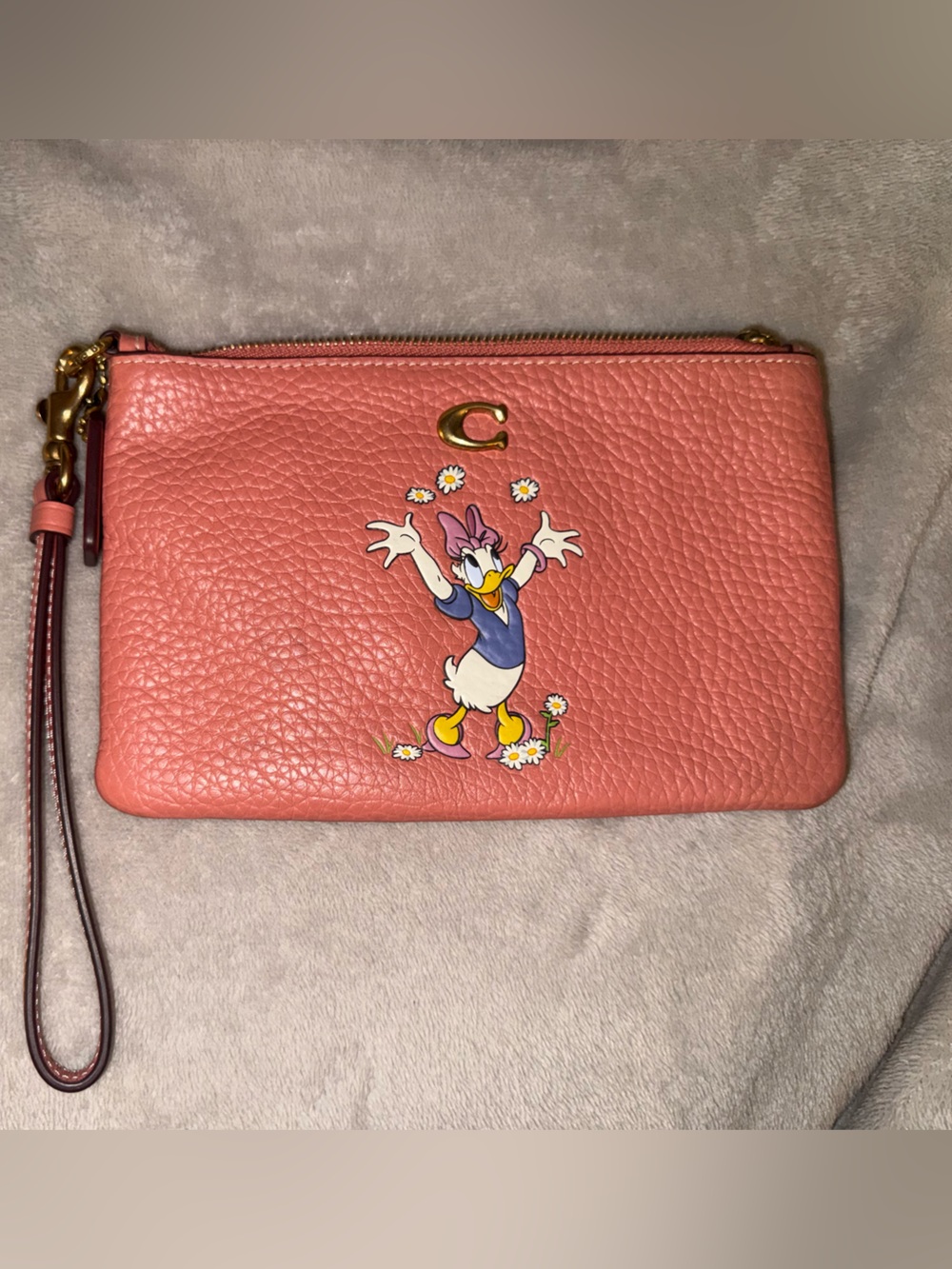 COACH x DISNEY Daisy Leather Wristlet Pouch in Coral Pink